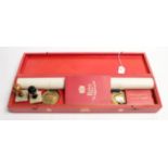 An Elizabeth II 1954 Freedom of the City of London presentation scroll, and associated items, in a