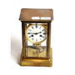 A brass four glass striking mantle clock, circa 1900