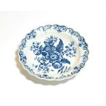 An 18th century Caughley blue and white scalloped dish, 18.5cm diameter