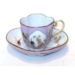 A Meissen cup and saucer, hand painted in the Chinese famille rose style