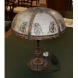 An American lamp with painted sectional glass shade