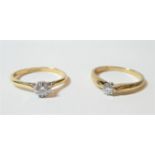 A 9 carat gold diamond solitaire ring, finger size P and another diamond solitaire ring, stamped '