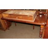 A late Victorian walnut extending dining table, with two additional leaves and winding handle, 176cm