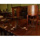 A mahogany tripod table with ball and claw feet; another similar; and a Edwardian mahogany inlaid