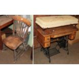 An oak gateleg dining table, a Treadle sewing machine, a foot stool, an elm rocking chair, a
