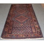 Isparta rug, the sky blue field with two diamond medallions within polychrome borders, 231cm and