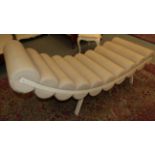 A 1930s upholstered chaise longue