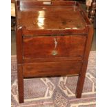 A George III mahogany tray top commode, late 18th century, the gallery top with three apertures as