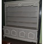 A 19th century grey painted dresser, the base with four cupboard doors, 208cm wide
