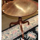 A George III mahogany tilt top tripod table