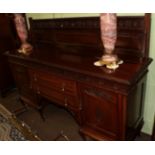 An early 20th century mahogany sideboard