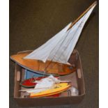 Three pond yachts and a scratch built model of a fishing boat (4)