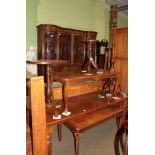 A group of mahogany furniture comprising two coffee tables, a pedestal table, a wine table, and a