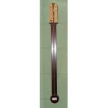 A reproduction stick barometer, exposed mercury tube with single Vernier scale, signed Comitti 7