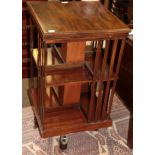 A 20th century mahogany revolving bookstand