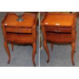 A pair of reproduction fruitwood bedside tables