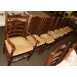 A set of eight (6+2) Lancashire ladder back chairs, 19th century, rush seats (8)