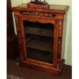 A 19th century walnut pier cabinet with inlaid marquetry panels and gilt metal mounts