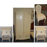 A cream painted wardrobe, a pair of matching bedside tables, and a similar chair (4)