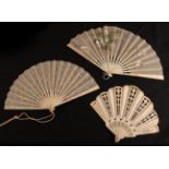 An early 20th century bone fan, the monture gently shaped with slight gold and pink decoration,