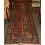 An unusual Anatolian runner, the field of stylised trees and buildings enclosed by flower head