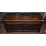 An early 18th century joined oak chest with hinged lid