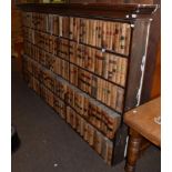 A large bookcase with ebony stringing, in two sections, the base section 275cm wide by 46cm deep