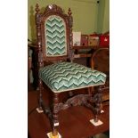 A 19th century part upholstered carved oak hall chair, in 17th century style