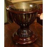 A 19th century mahogany planter with brass liner