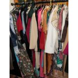 A quantity of assorted circa 1970s and 80's costume, evening dresses, cotton dresses, separates,