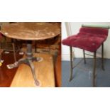An 18th century oak circular tilt top tripod table and a brass stool with red button seat