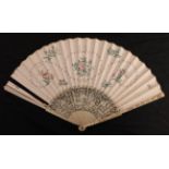 An 18th century ivory fan with carved Chinese Export monture, the double leaf delicately painted
