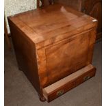 An 18th century oak chest, probably adapted from a commode, with brass solid plate side carrying