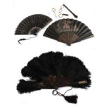 Three 19th century fans and optical accessories, to include a black ostrich feather fan mounted on