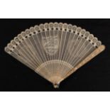 A large late 18th century Chinese carved ivory brisé fan Qing Dynasty, finely carved throughout with