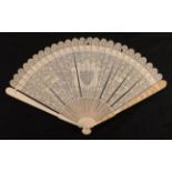 A large late 18th century carved ivory brisé fan, Qing dynasty, the very finely carved 25 inner