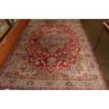 A machine made carpet of Oriental design, 290cm by 201cm