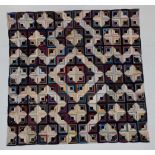 Late 19th Century Log Cabin Patchwork Quilt, comprising silk and velvet patches, with pale blue