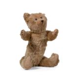 Circa 1920s German/American Jointed Teddy Bear, in light brown mohair with boot button eyes,