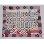 Circa 1900 African American Block Quilt, incorporating bright decoratively coloured printed cottons,