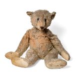 A Large Early 20th Century Steiff Teddy Bear, with button to his ear, large black button eyes,