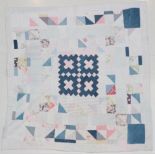 Late 19th/Early 20th Century Reversible Patchwork Quilt, with a central square pattern of mid blue