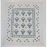 A Late 19th Century Unfinished Quilt, appliquéd with green baskets to the centre of the quilt,