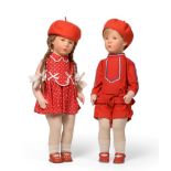 Pair of Circa 1950's Käthe Kruse Dolls, the little boy is dressed in a red cotton long sleeved top