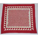 Late 19th Century Turkey Red and White Patchwork Quilt, centre worked with hexagonal wheels,