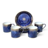 A Set of Four Sèvres Porcelain Coffee Cans and Saucers, 19th century, gilt with foliate and