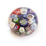A Baccarat Miniature Millefiori Paperweight, circa 1850, set with various coloured canes, 4cm