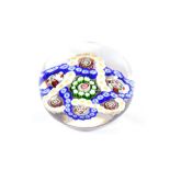 A Baccarat Double Trefoil Paperweight, circa 1850, with blue, white and yellow interlaced garlands