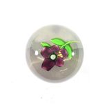 A St Louis Pansy Paperweight, circa 1850, with five purple petals and ochre stripes on a green stem,