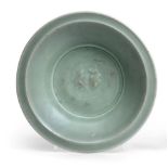 A Chinese Longquan Celadon Glazed Dish, Ming Dynasty, the centre moulded with twin fish, 20cm